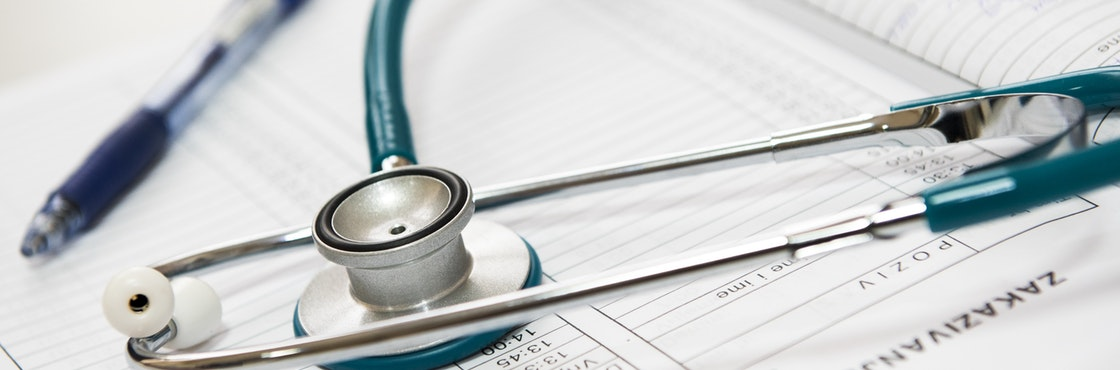 Medical stethoscope on forms - Alberta Health Services